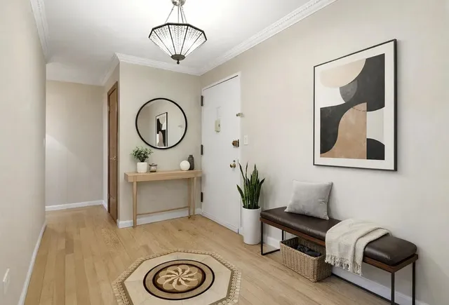 a view of living room filled with furniture and window