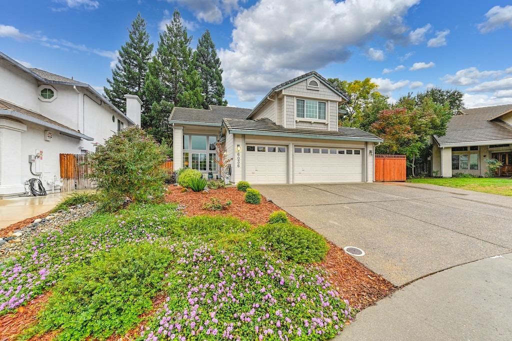 6036 Turquoise Drive Rocklin, CA 95677 - Photo 1 of 1 a front view of a house with garden