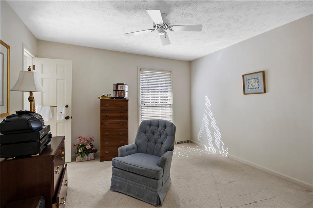 112 Thornwood Drive Southwest Rome, GA 30165 - Photo 18 of 30 a living room with furniture and a window