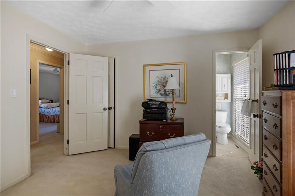 112 Thornwood Drive Southwest Rome, GA 30165 - Photo 19 of 30 a living room with furniture and a flat screen tv