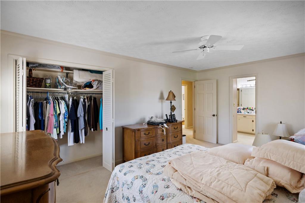 112 Thornwood Drive Southwest Rome, GA 30165 - Photo 23 of 30 a bedroom with a bed and closet