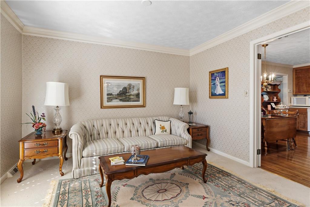 112 Thornwood Drive Southwest Rome, GA 30165 - Photo 9 of 30 a living room with furniture and wooden floor