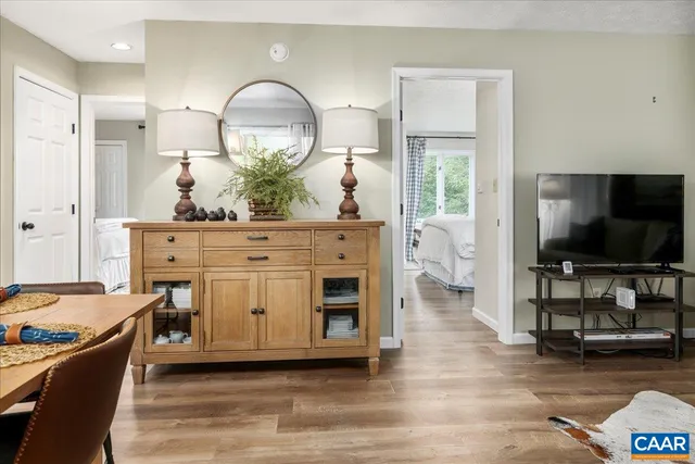 a living room with furniture and a table