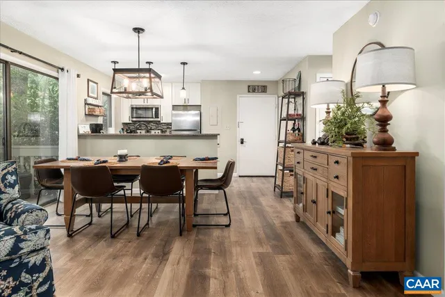 a white toilet sitting next to a shower curtain