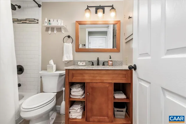 a view of a wooden bench on the deck