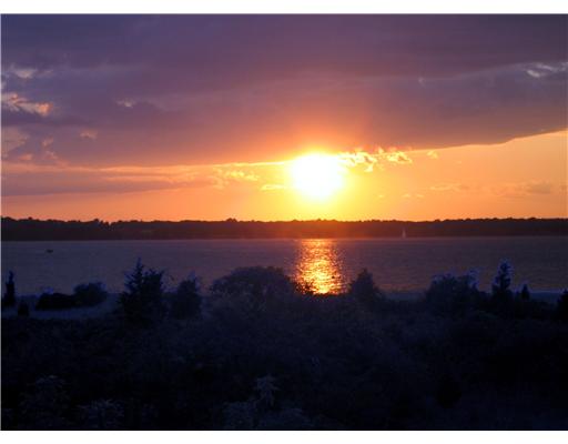 1334 Anthony Road Portsmouth, RI 02871 - Photo 17 of 19 View. Sunset over Mt. Hope Bay viewed from the deck.
