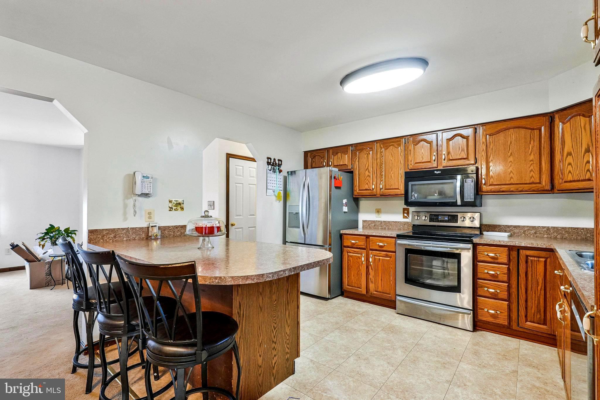 13605 Martin Road Brandywine, MD 20613 - Photo 21 of 105 Main Level Kitchen w/peninsula