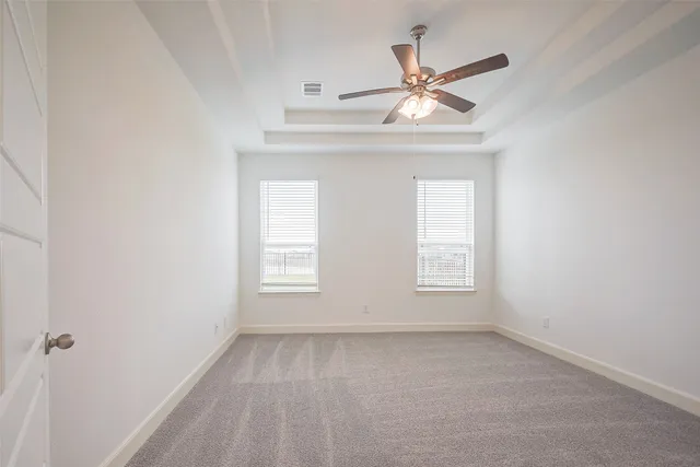 a view of a pathway with a yard