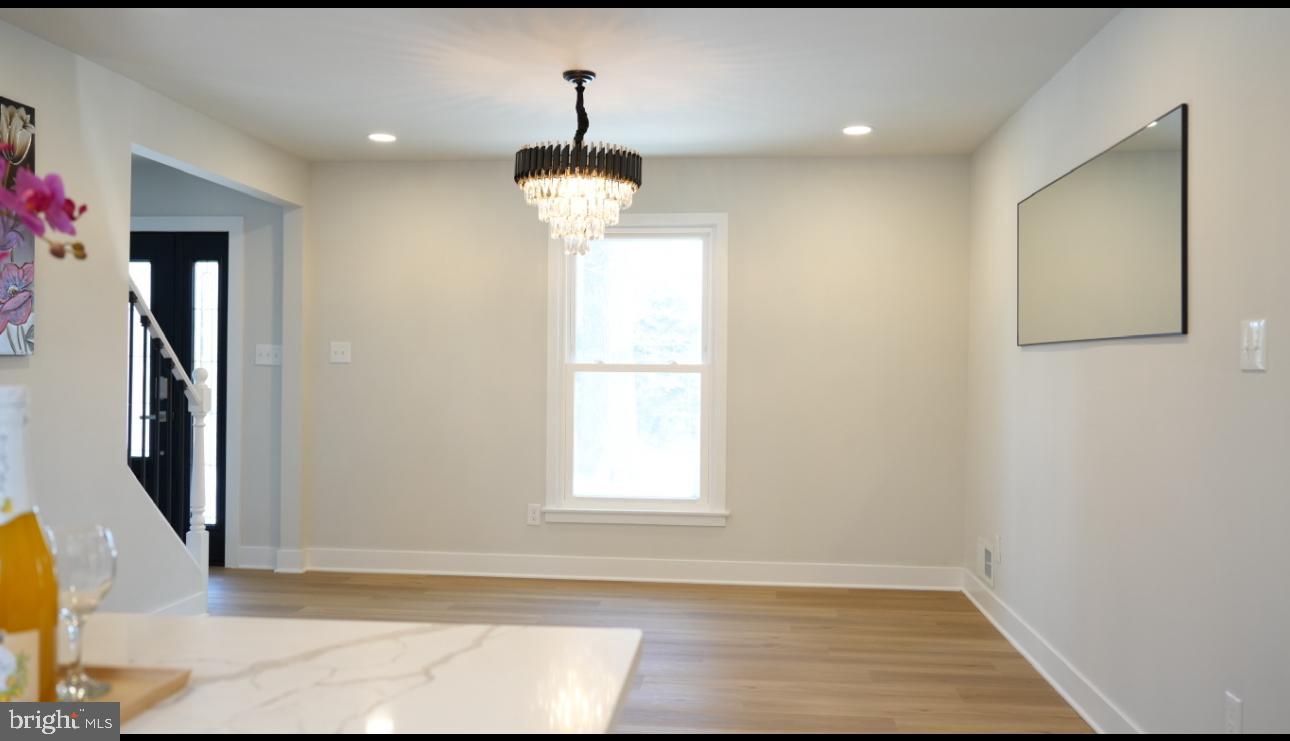 5114 Montgomery Road Ellicott City, MD 21043 - Photo 12 of 34 Bright and airy space with elegant lighting.