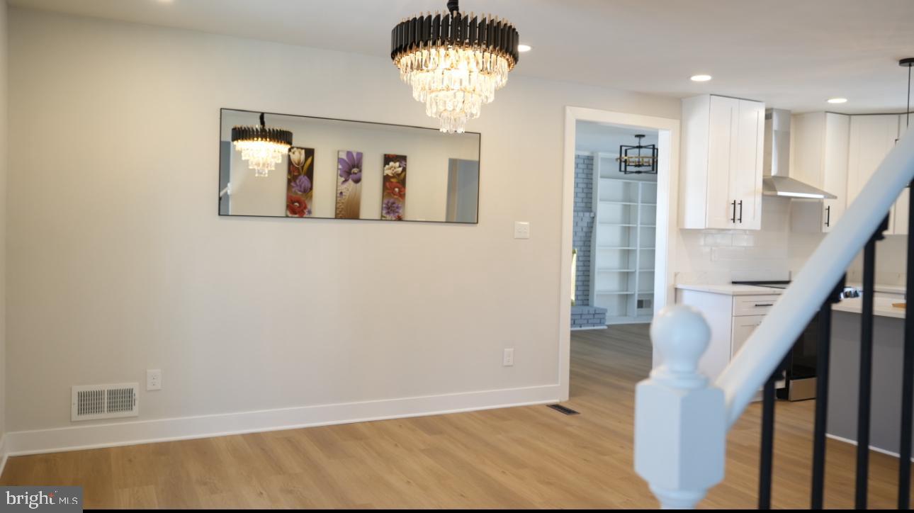 5114 Montgomery Road Ellicott City, MD 21043 - Photo 13 of 34 Elegant space with modern lighting accents.