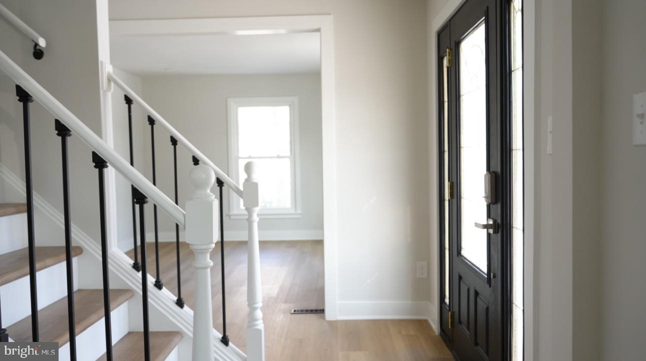 5114 Montgomery Road Ellicott City, MD 21043 - Photo 27 of 34 Inviting entryway with modern elegance.