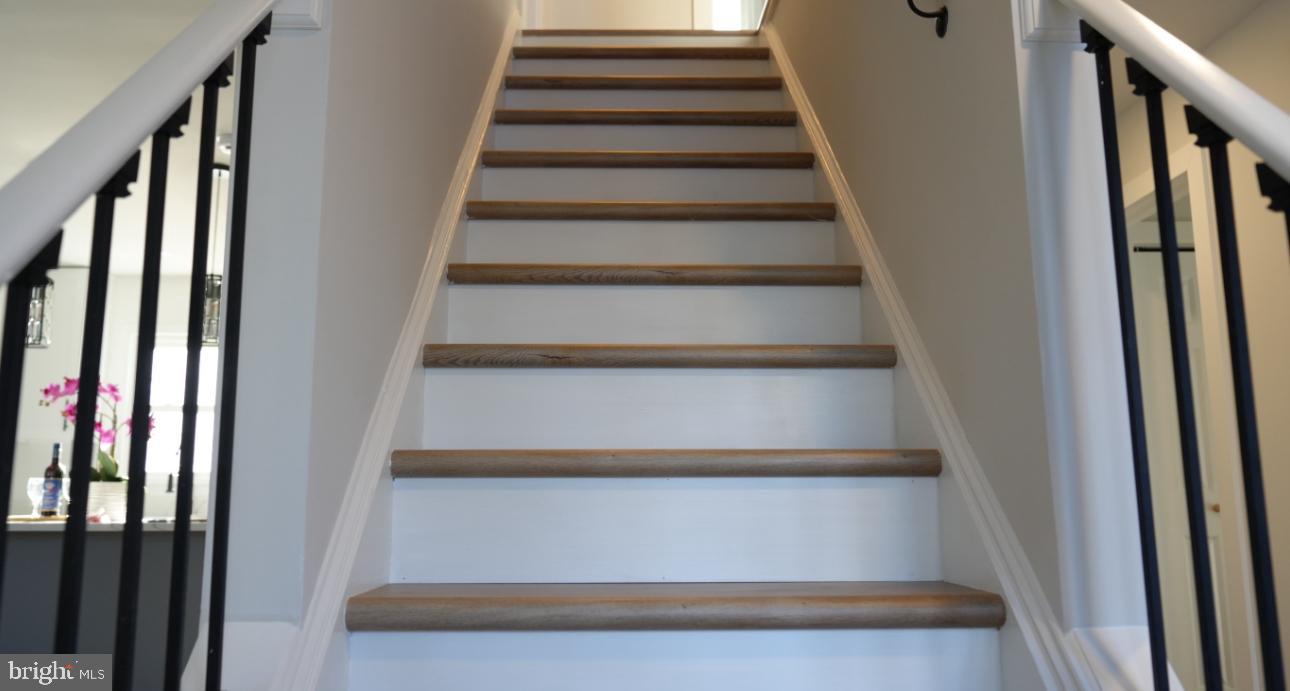 5114 Montgomery Road Ellicott City, MD 21043 - Photo 29 of 34 Inviting staircase leading to new horizons.