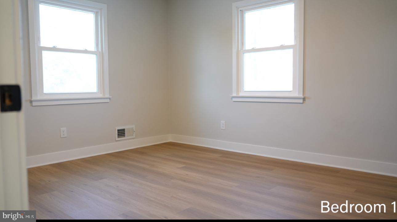 5114 Montgomery Road Ellicott City, MD 21043 - Photo 34 of 34 Bright and airy bedroom with natural light.