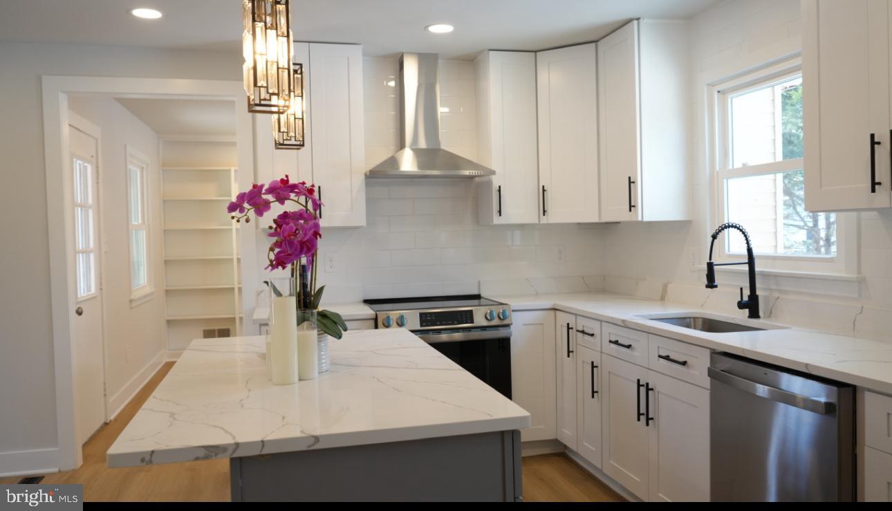 5114 Montgomery Road Ellicott City, MD 21043 - Photo 5 of 34 Modern kitchen with elegant finishes.