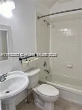 an empty room with wooden floor