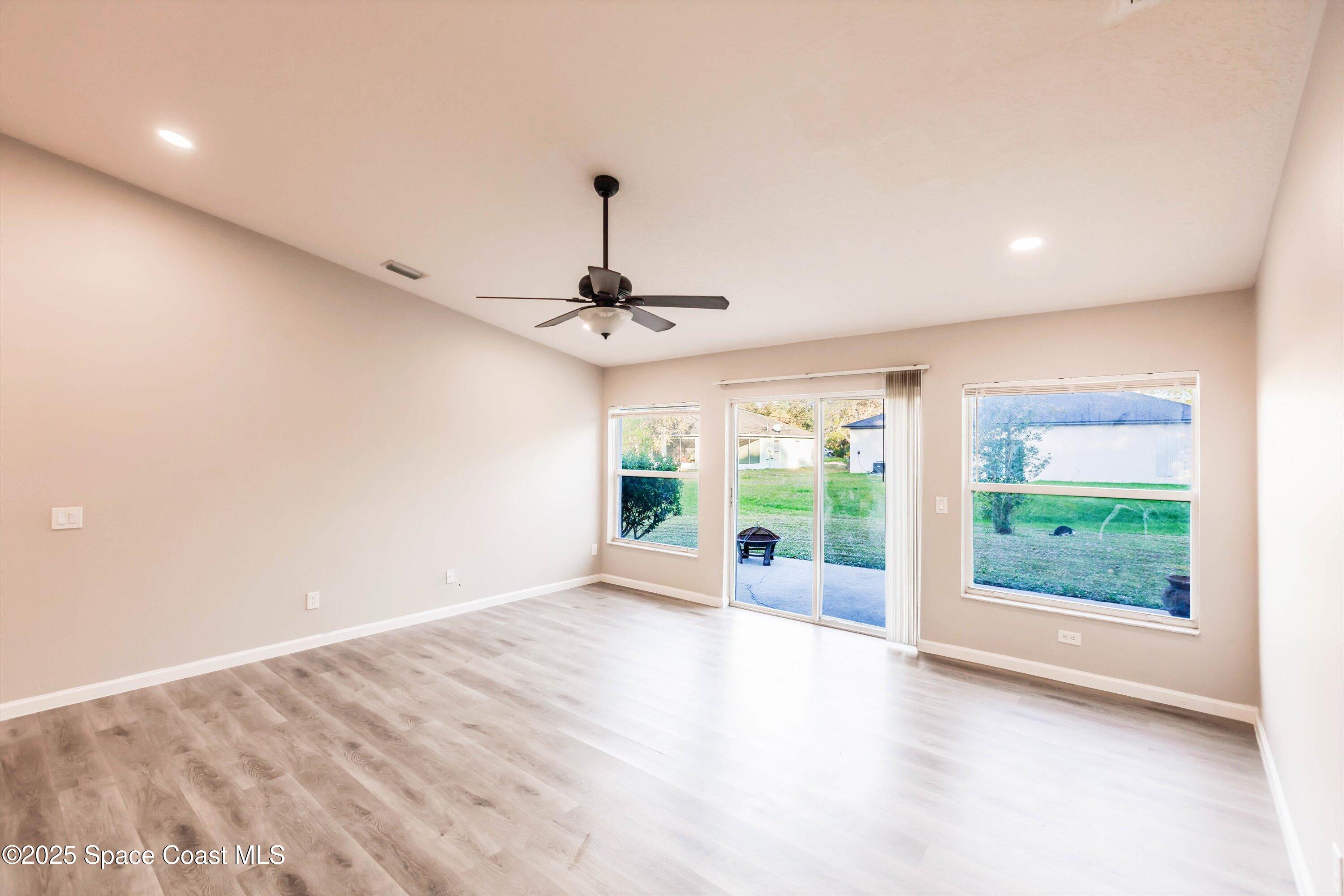 3061 Tazewell Avenue Southeast Palm Bay, FL 32909 - Photo 11 of 30 a view of an empty room with a window