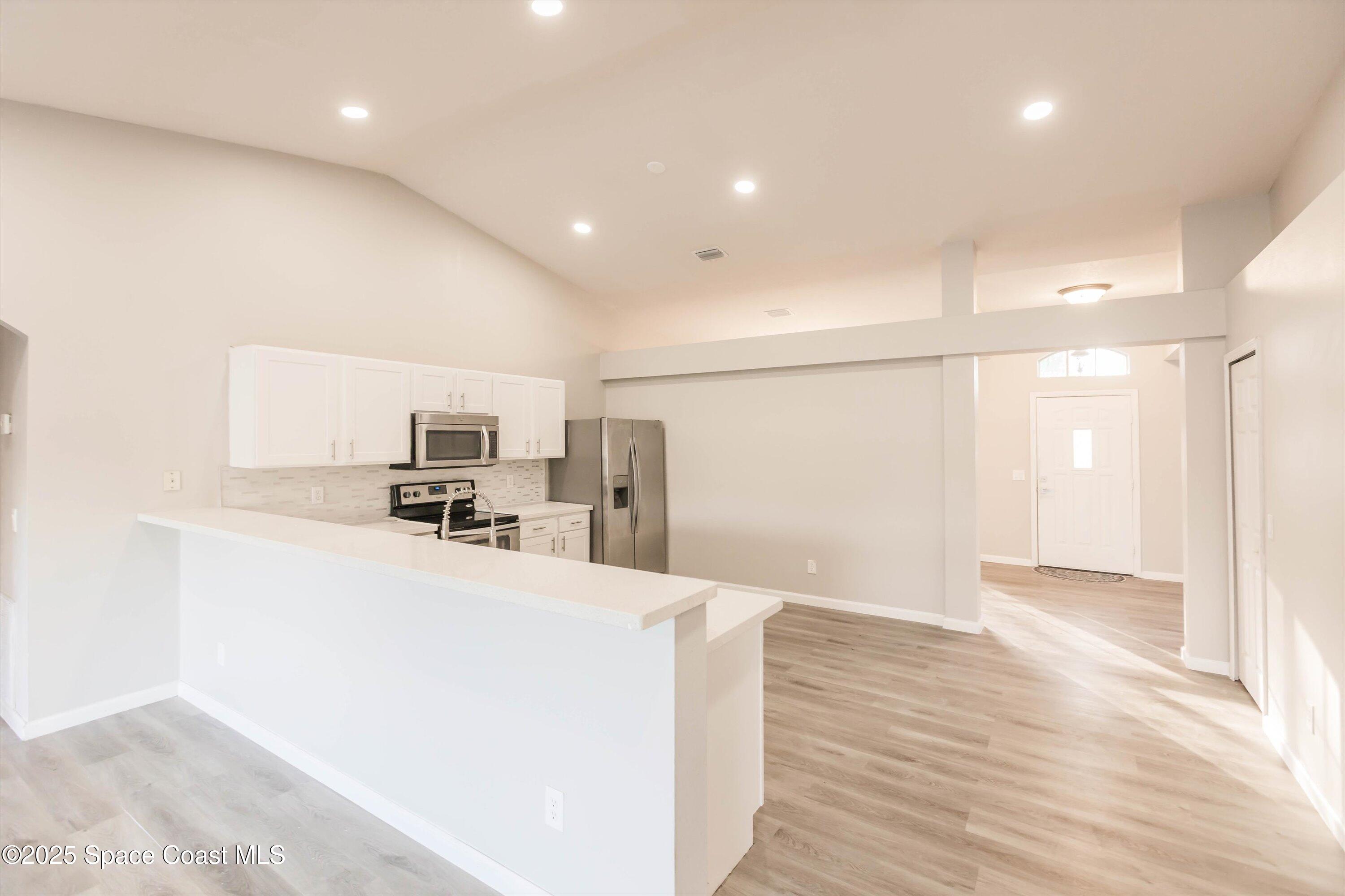 3061 Tazewell Avenue Southeast Palm Bay, FL 32909 - Photo 14 of 30 a view of a kitchen with a sink