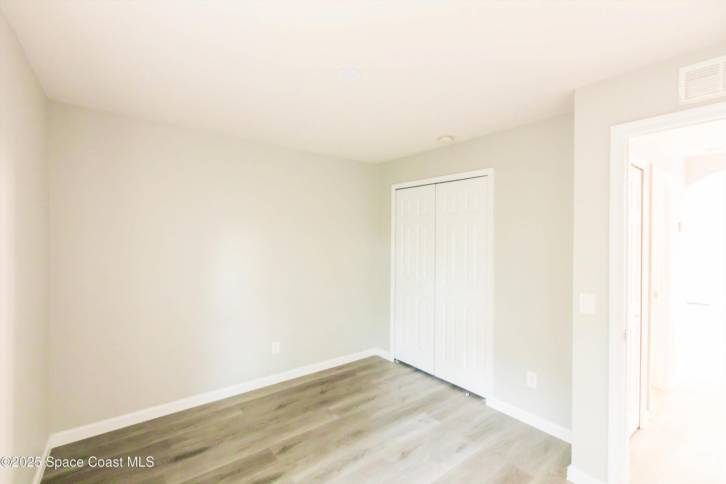 3061 Tazewell Avenue Southeast Palm Bay, FL 32909 - Photo 27 of 30 a view of an empty room