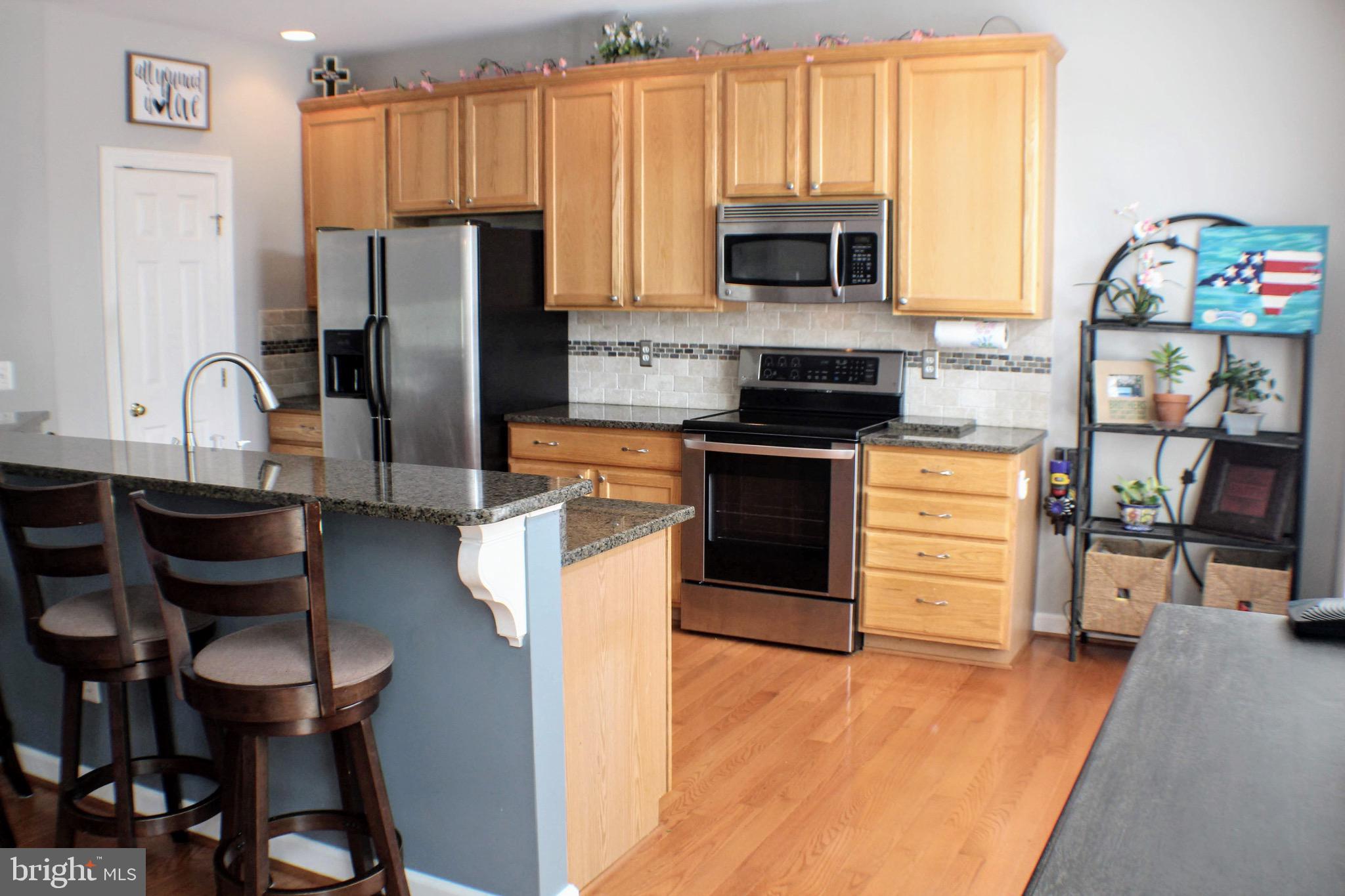 43059 Golf View Drive Chantilly, VA 20152 - Photo 10 of 46 Door to huge pantry - tons of storage!