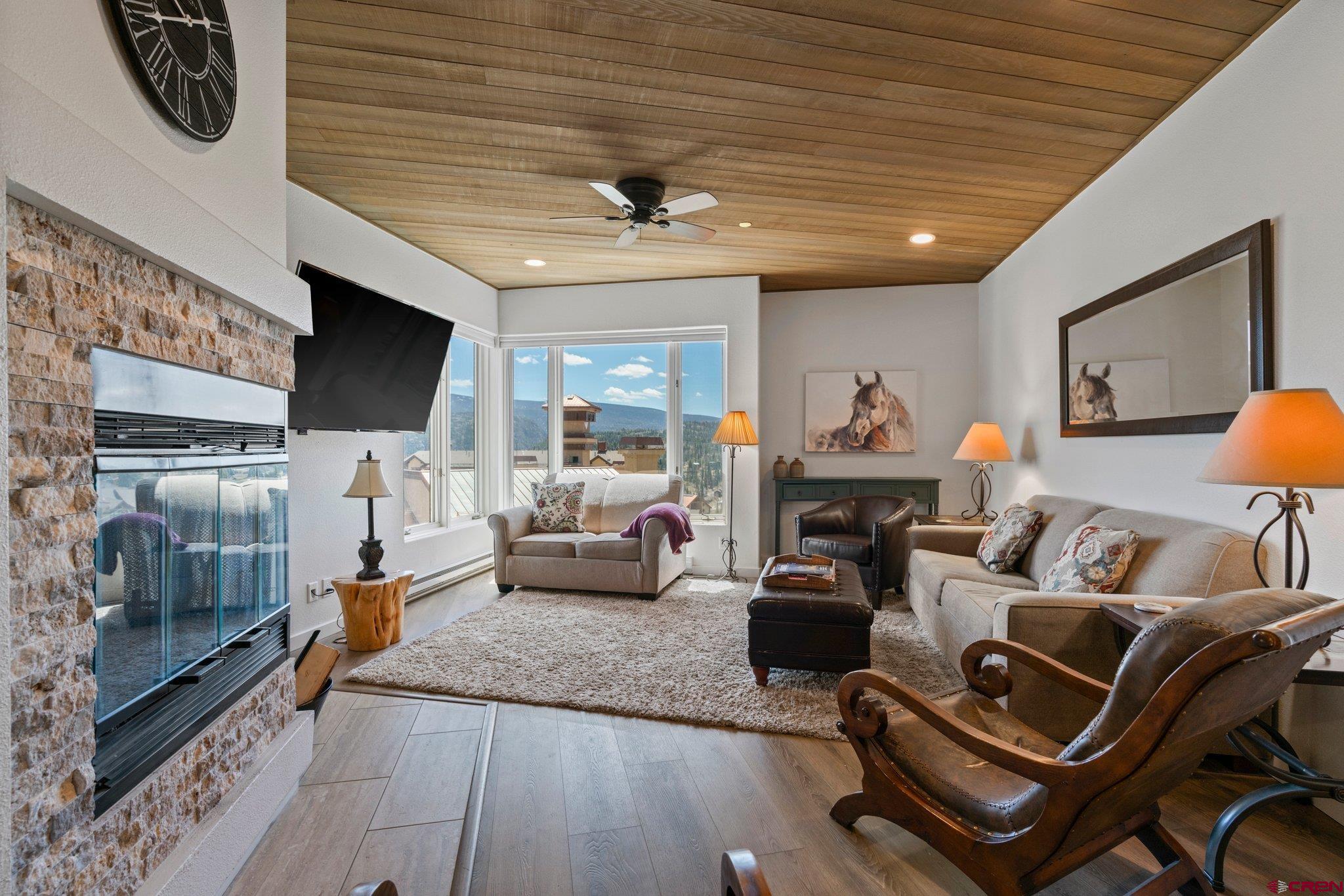 117 Needles Way, Unit 624 Durango, CO 81301 - Photo 14 of 32 a living room with furniture and a flat screen tv