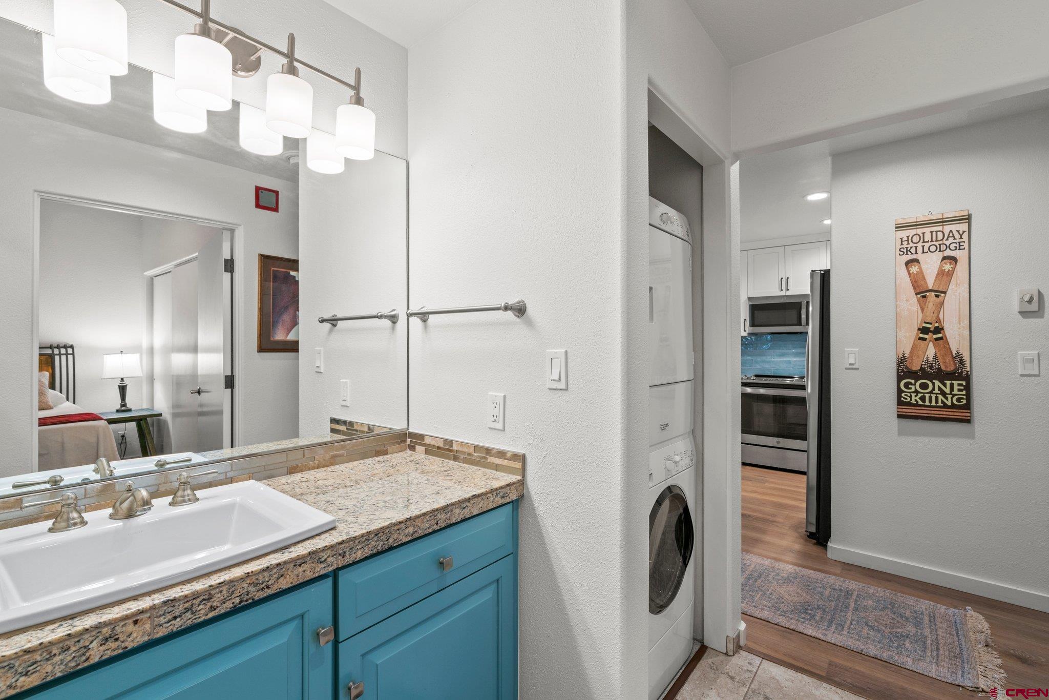 117 Needles Way, Unit 624 Durango, CO 81301 - Photo 10 of 32 a bathroom with a sink and a mirror