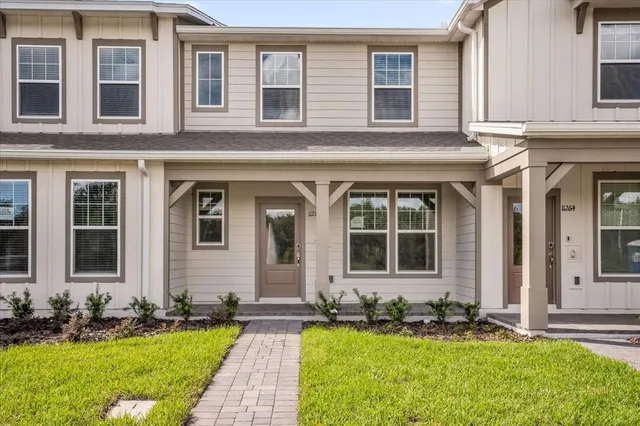 front view of a house with a yard
