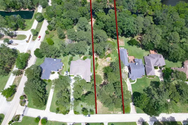 an aerial view of house with yard