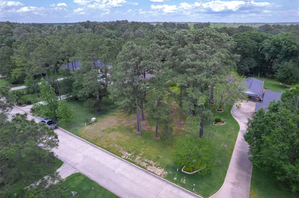 an aerial view of multiple house with yard
