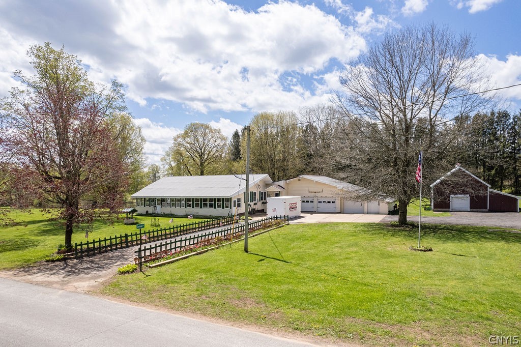 435 County Rte 30 Williamstown, NY 13302 - Photo 3 of 48 Circular Driveway lined with Vibrant Flower Beds