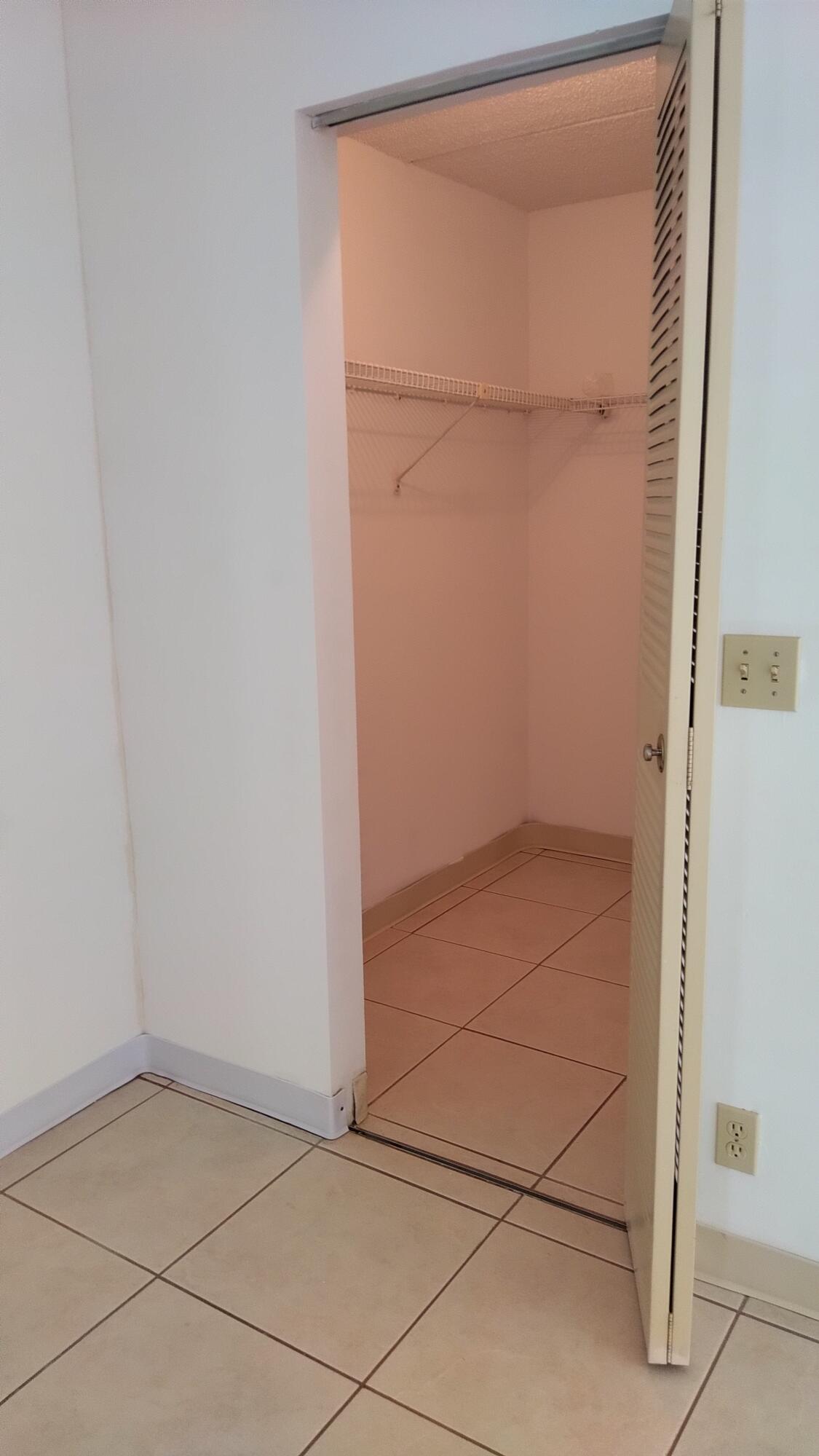 3300 Springdale Boulevard, Unit 208 Palm Springs, FL 33461 - Photo 17 of 21 a view of an empty room