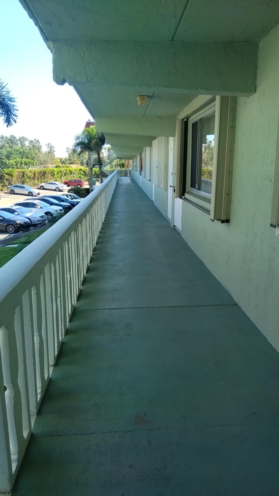 3300 Springdale Boulevard, Unit 208 Palm Springs, FL 33461 - Photo 5 of 21 a view of an ocean from a balcony