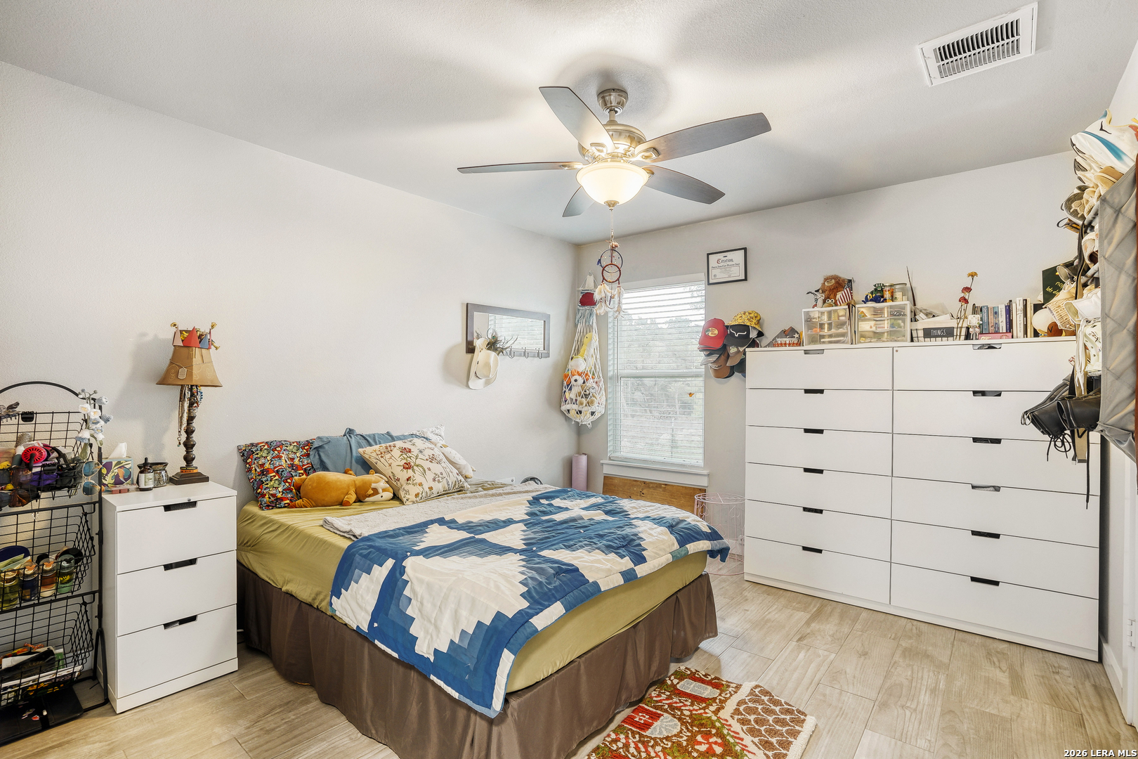 1209 Covered Wagon Spring Branch, TX 78070 - Photo 13 of 29 a bedroom with a bed and closet