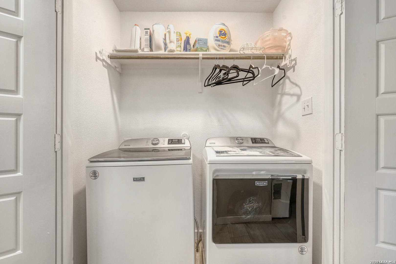 1209 Covered Wagon Spring Branch, TX 78070 - Photo 24 of 29 a view of a stove top oven and cabinets