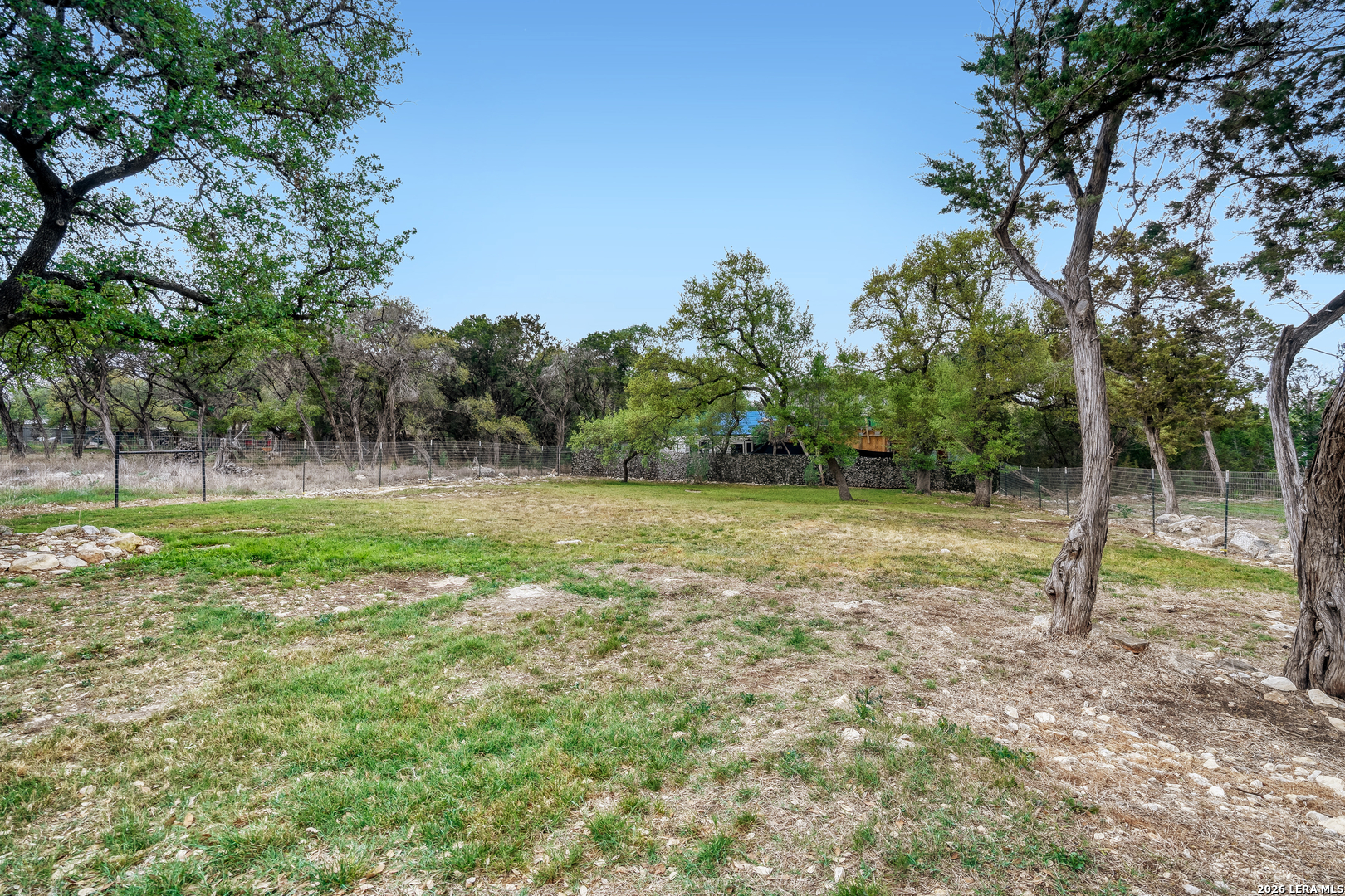1209 Covered Wagon Spring Branch, TX 78070 - Photo 26 of 29 a view of outdoor space with deck and yard