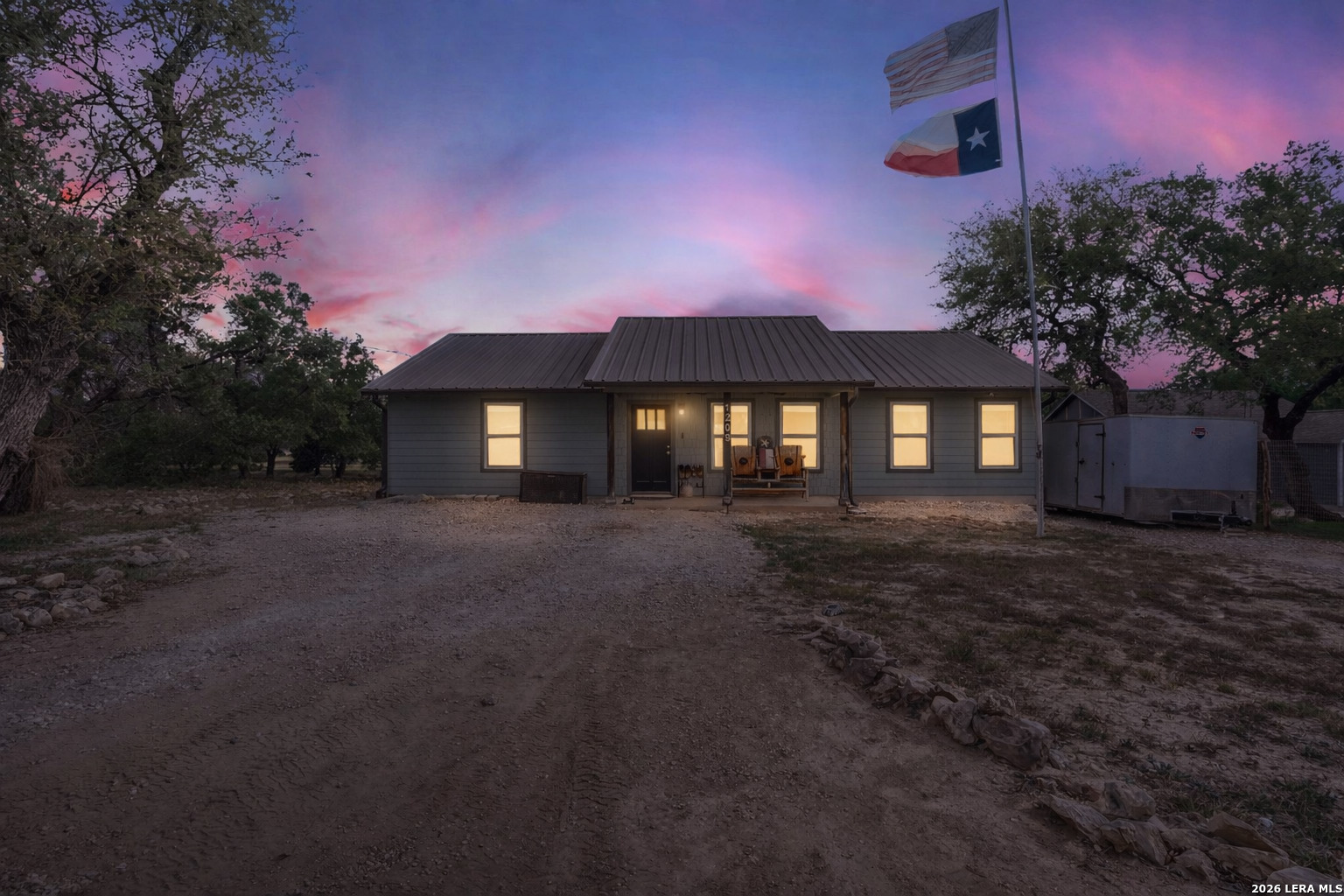 1209 Covered Wagon Spring Branch, TX 78070 - Photo 29 of 29 a front view of a house with yard and green space