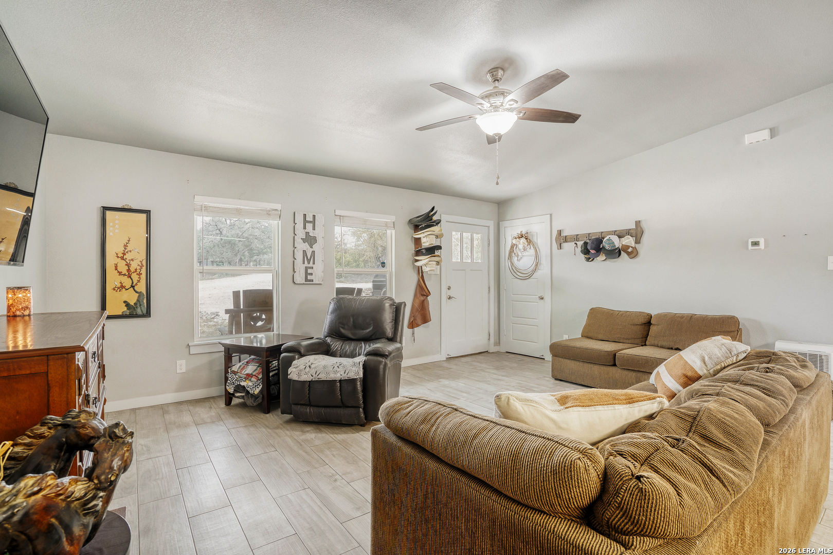 1209 Covered Wagon Spring Branch, TX 78070 - Photo 8 of 29 a living room with furniture and a large window