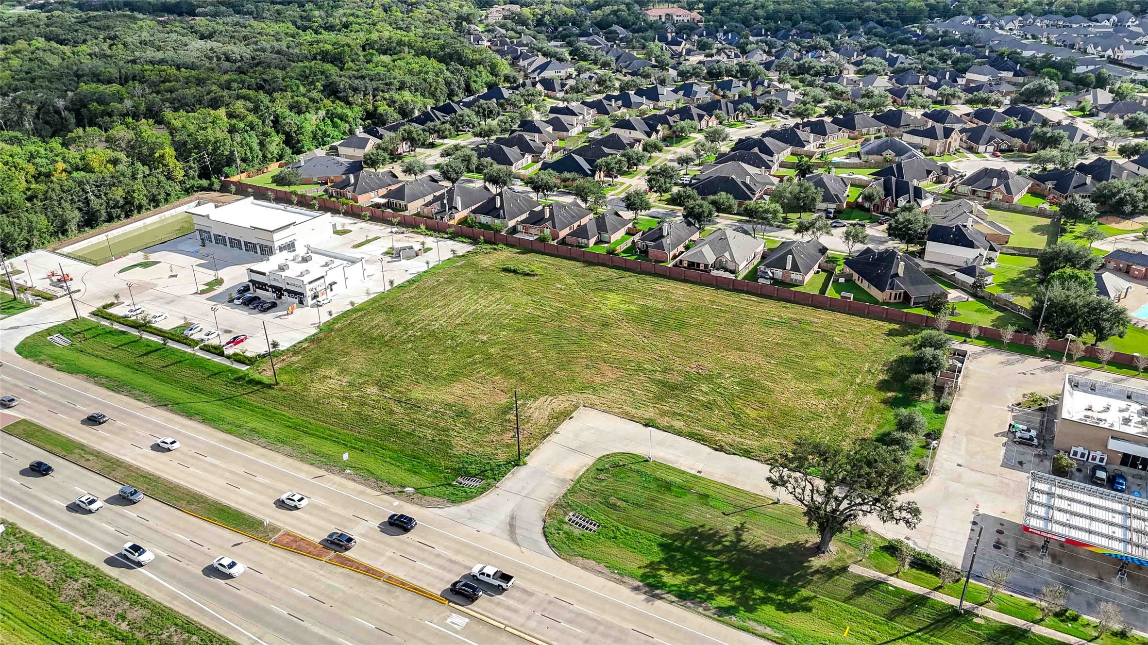 11600 Highway 6 Fresno, TX 77545 - Photo 2 of 9 an aerial view of a residential houses with outdoor space