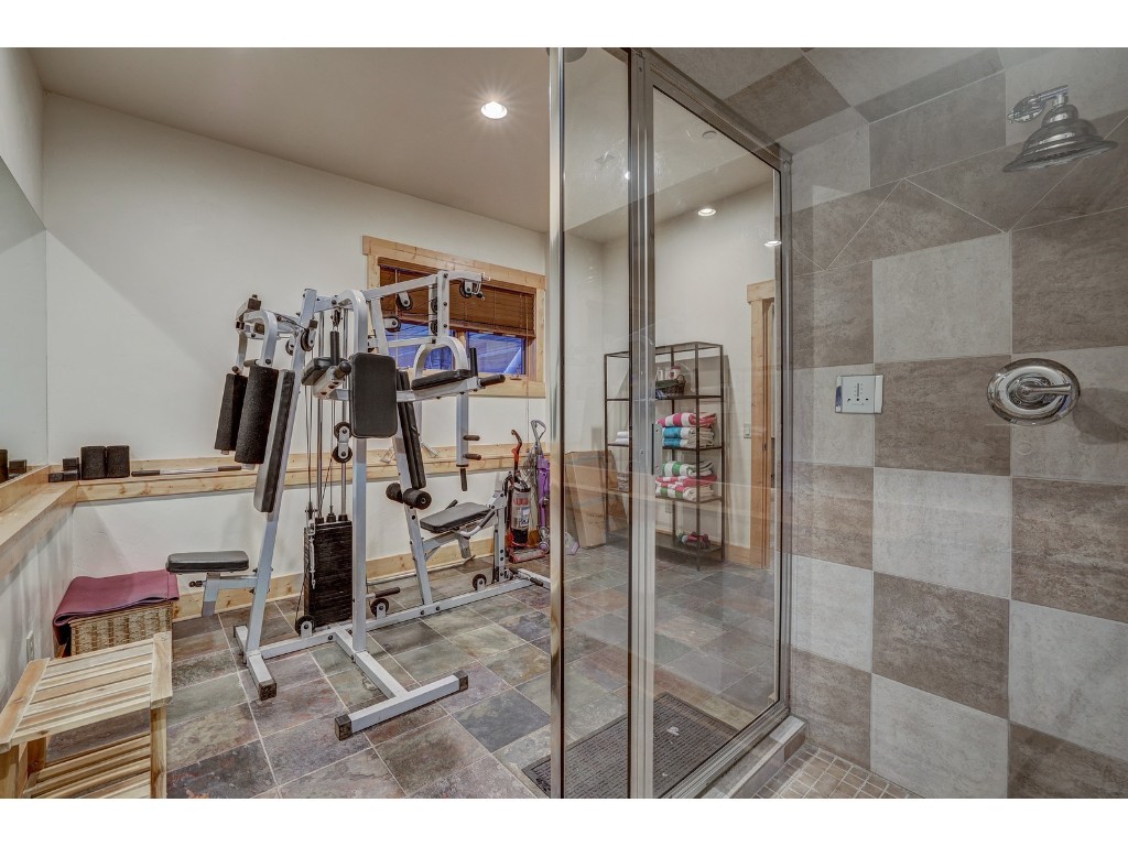 397 Whispering Pines Circle Blue River, CO 80424 - Photo 26 of 35 a bathroom with a mirror