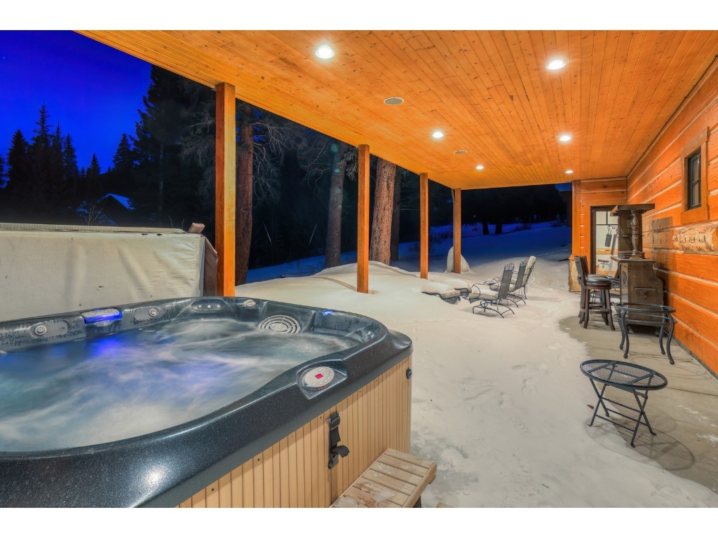 397 Whispering Pines Circle Blue River, CO 80424 - Photo 27 of 35 a view of a patio with table and chairs