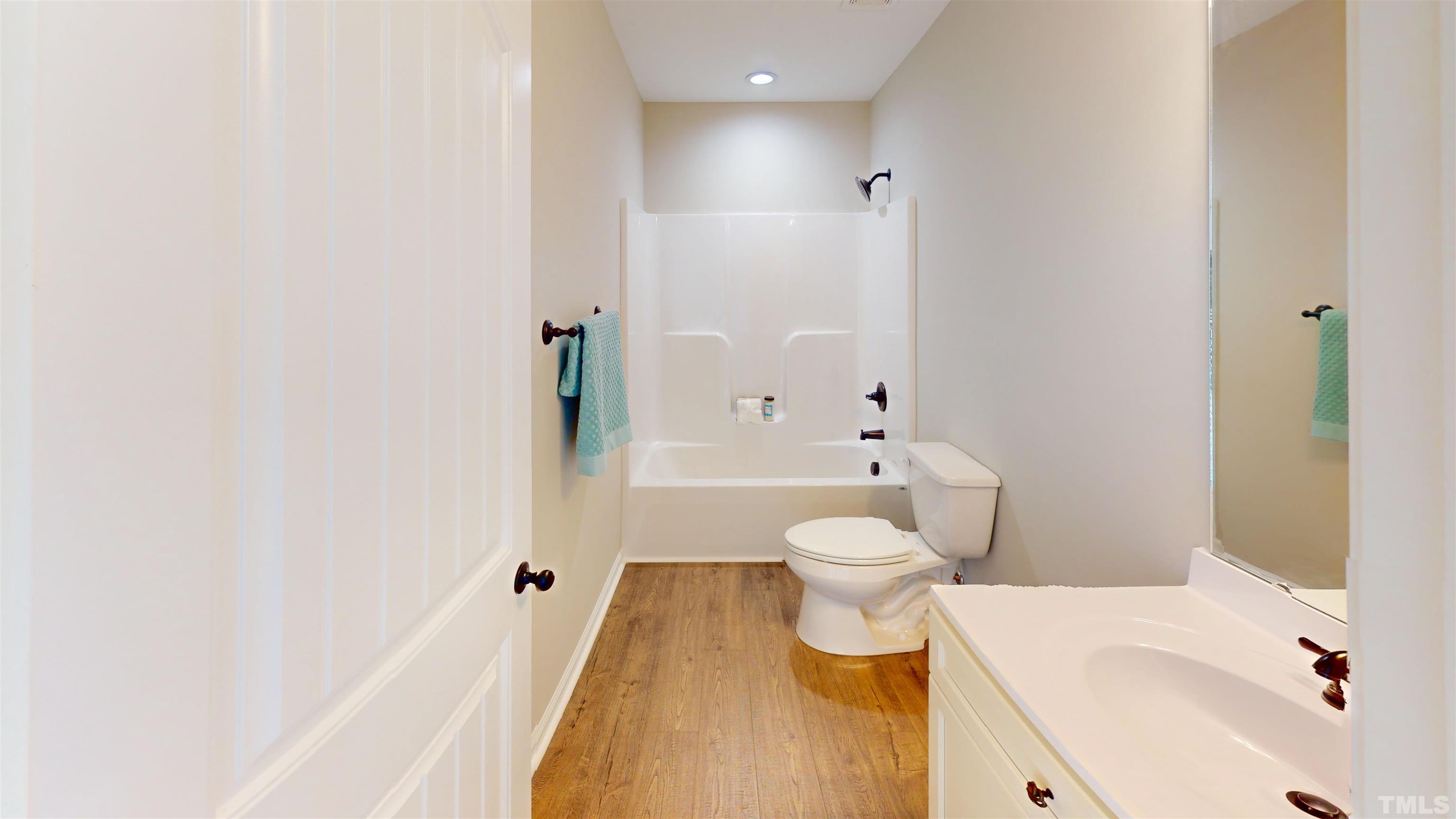 108 Mamie Road Benson, NC 27504 - Photo 19 of 31 a bathroom with a sink and toilet