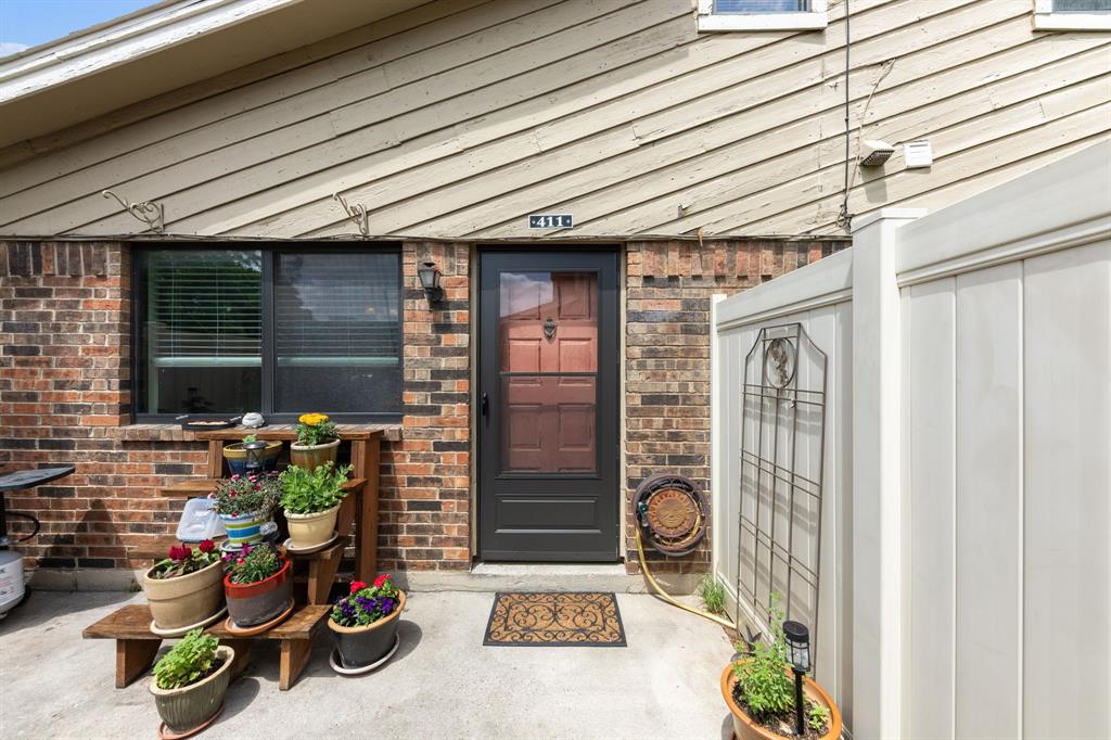 2240 Tarpley Road, Unit 411 Carrollton, TX 75006 - Photo 18 of 28 a view of outdoor space with porch