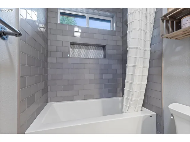 a bathroom with a bathtub