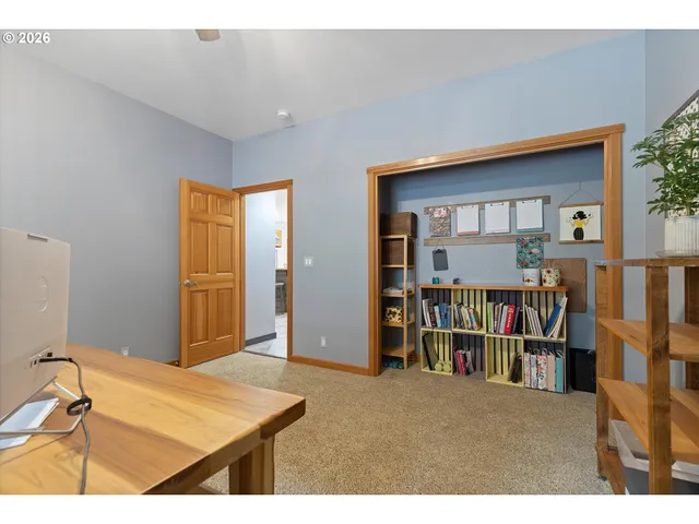a view of a livingroom with furniture
