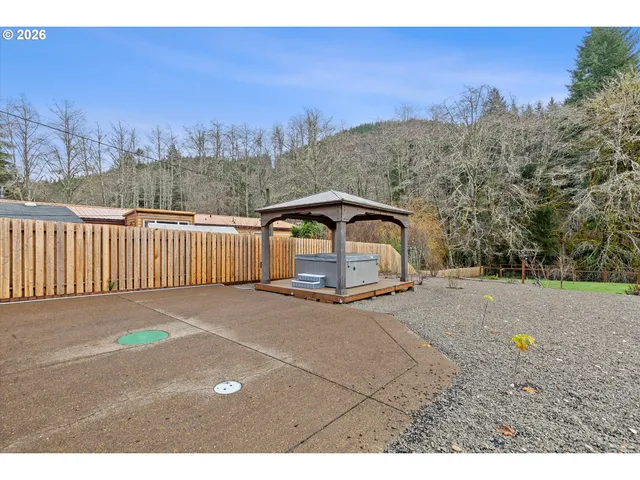 a view of a backyard of a house