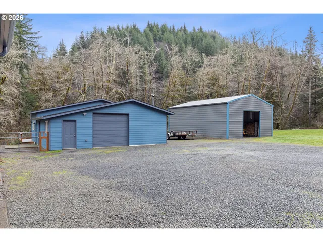 a view of a backyard of a house