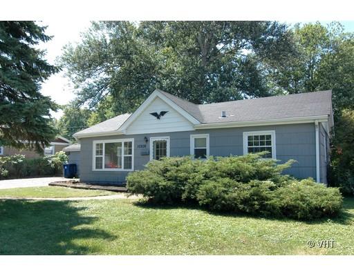 10936 Massasoit Avenue Chicago Ridge, IL 60415 - Photo 1 of 1 a front view of a house with a yard