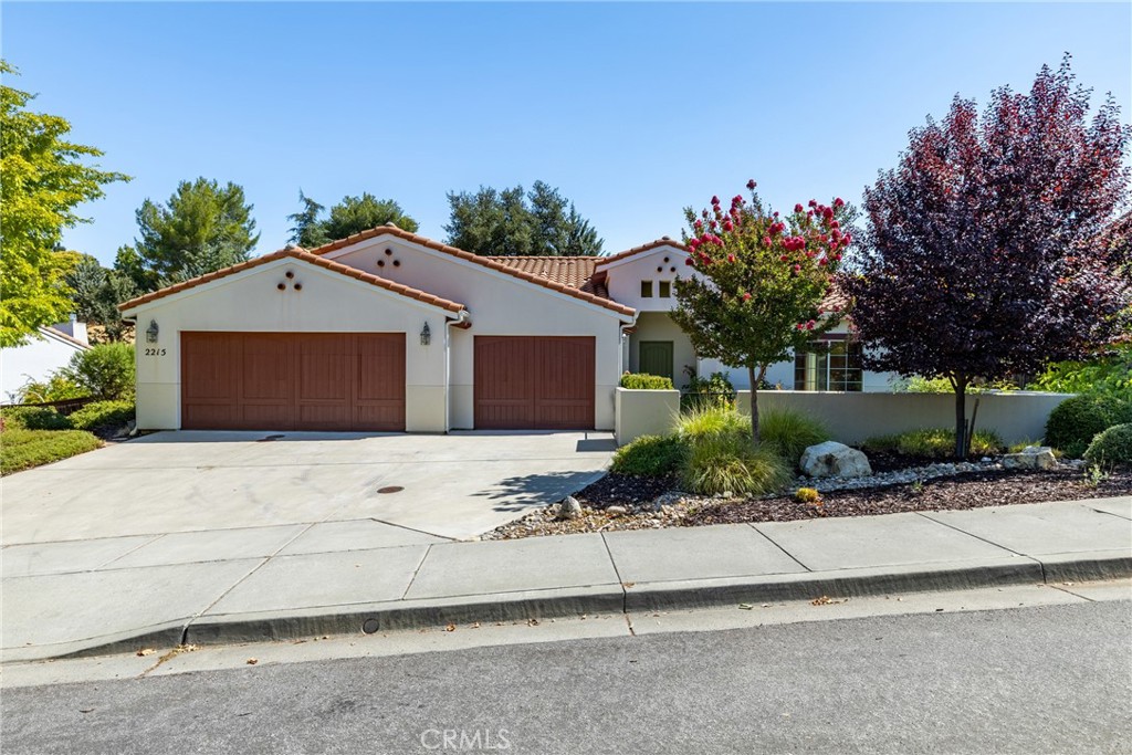 2215 San Ramon Road Atascadero, CA 93422 - Photo 1 of 1 a front view of a house with a yard and garage
