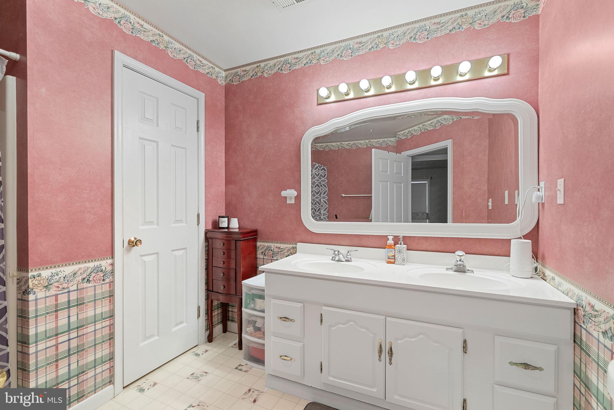 804 Telegraph Road Stafford, VA 22554 - Photo 20 of 39 a bathroom with a sink a vanity and a mirror