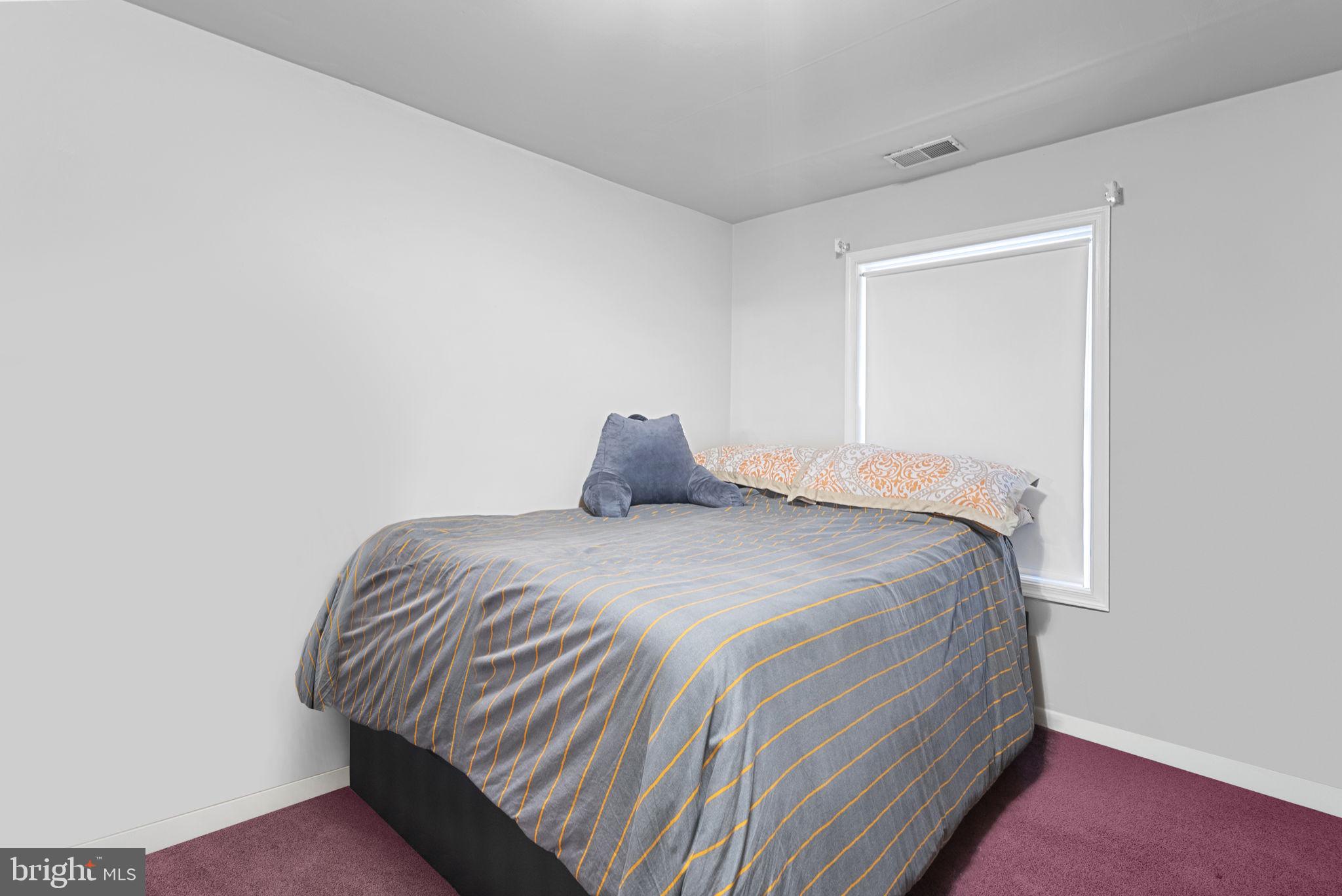 804 Telegraph Road Stafford, VA 22554 - Photo 23 of 39 a bedroom with a bed and a window