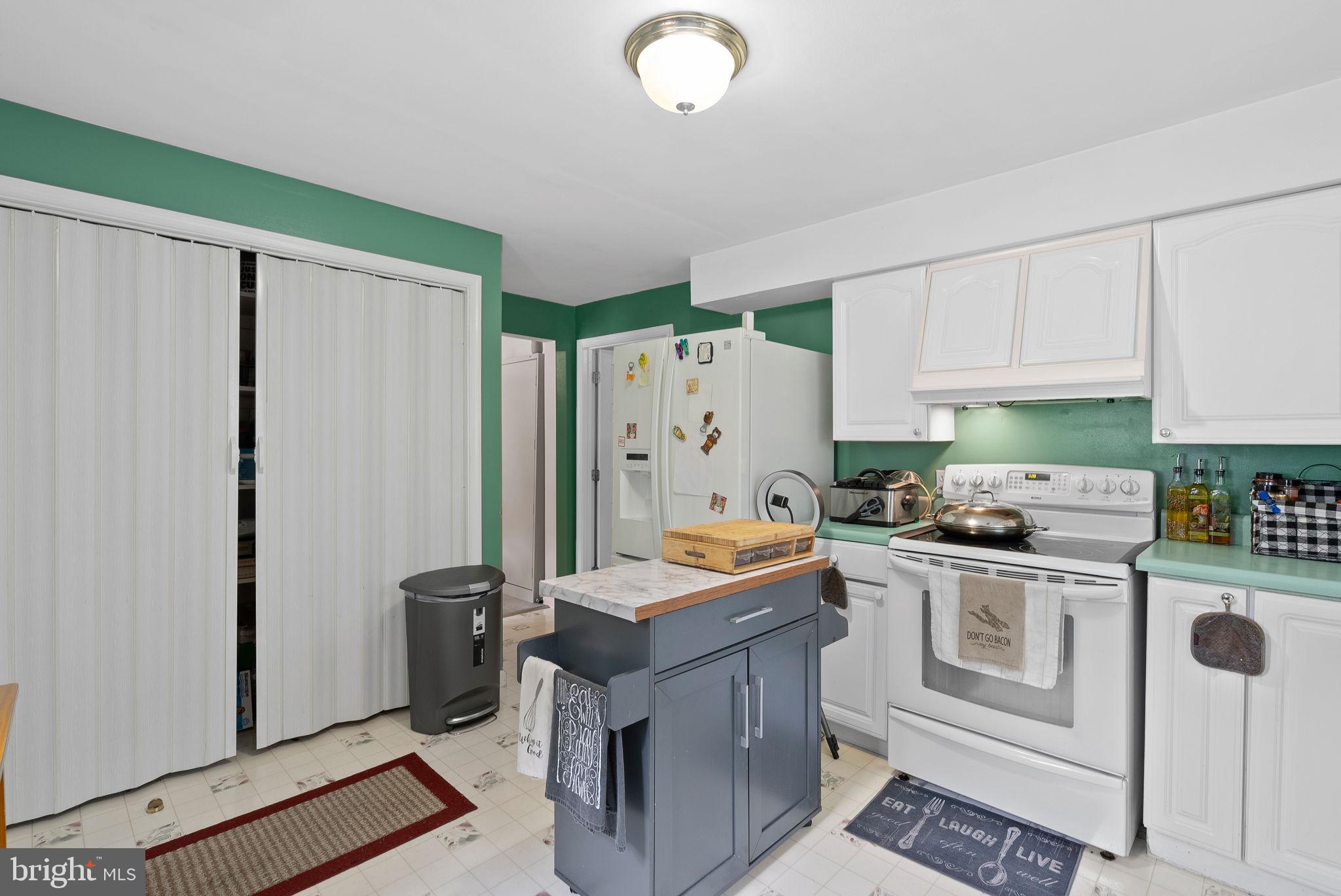 804 Telegraph Road Stafford, VA 22554 - Photo 26 of 39 a kitchen with stainless steel appliances granite countertop a refrigerator stove and sink
